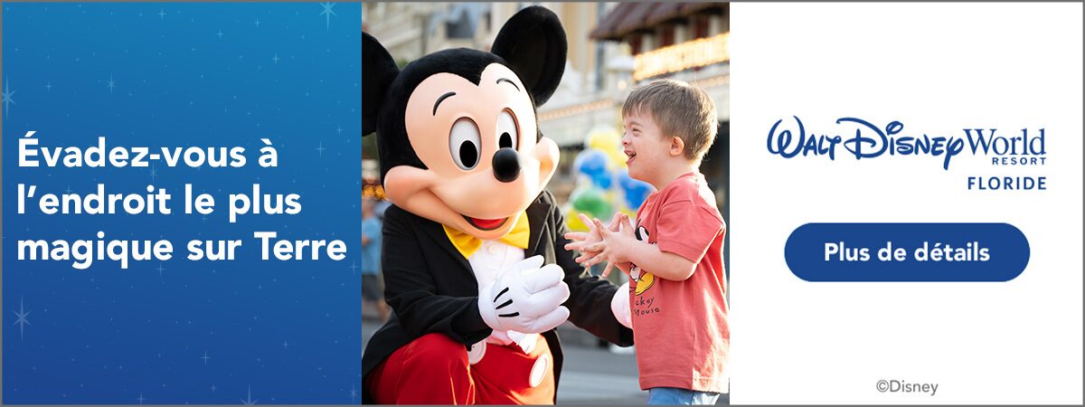 Mickey Mouse accueille un jeune garçon à Walt Disney World Resort en Floride, l'endroit le plus magique sur Terre Mickey Mouse accueille un jeune garçon à Walt Disney World Resort en Floride, l'endroit le plus magique sur Terre